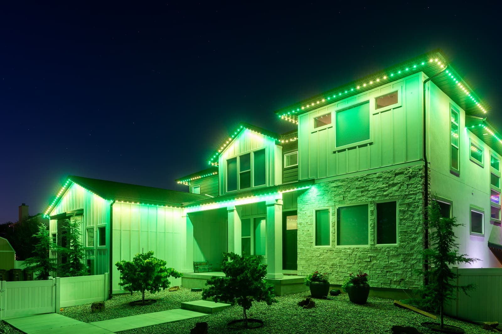 A house lit in bold team colors on game night.